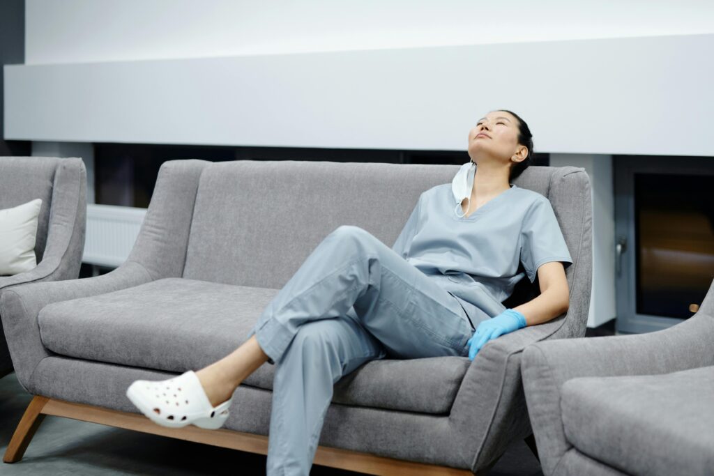 Nurse burnout moment of reflection alone after night shift in break room